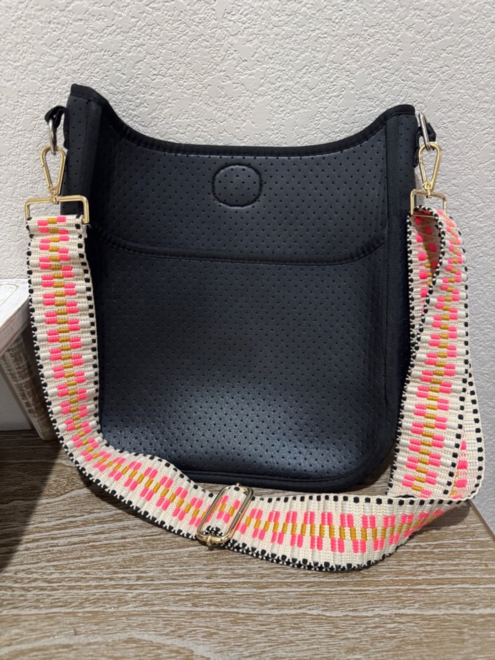 Black Neoprene Crossbody Bag with Pink-Accent Woven Strap
